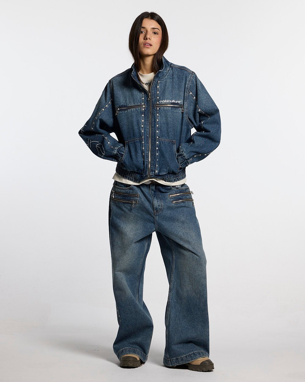 2010 DENIM JACKET BLUE DENIM - blue studded denim jacket, front view on female model - Cold Culture #woman