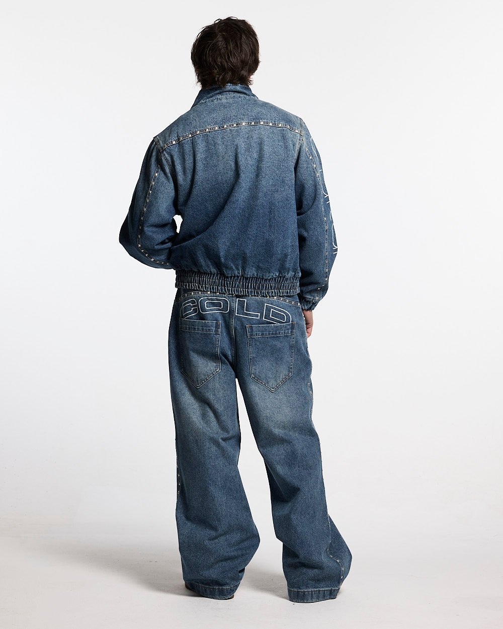 2010 DENIM PANTS BLUE DENIM - blue washed baggy jeans, back view on male model - Cold Culture #man