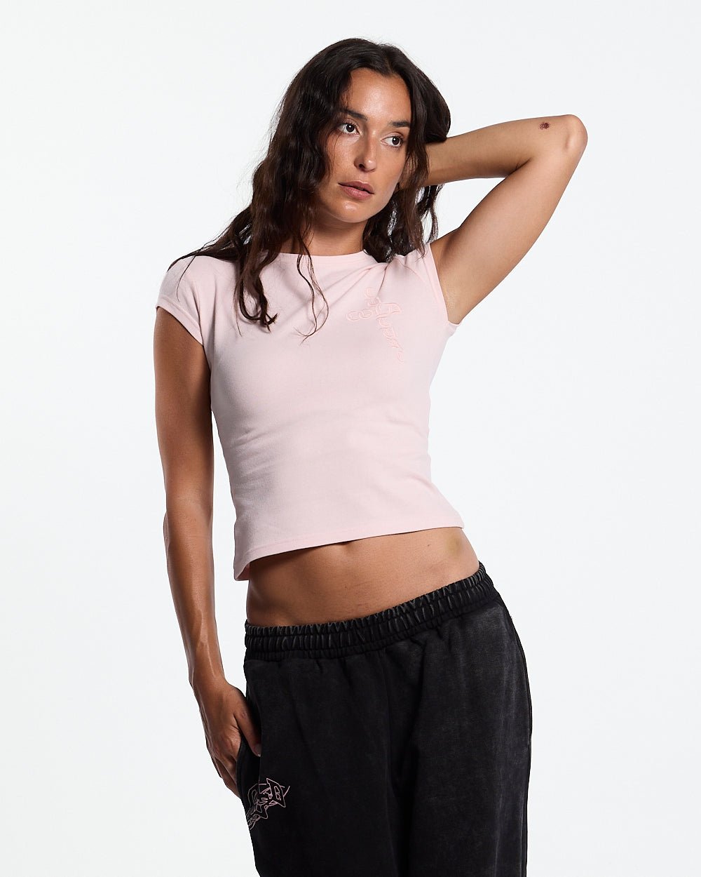 55 SWEATPANTS BLACK - washed black graphic sweatpants, front view on female model - Cold Culture #woman