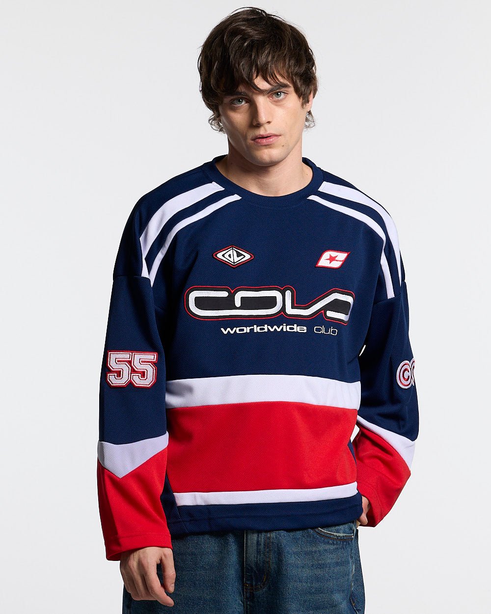 55 VIRAL LONGSLEEVE BLUE - navy and red longsleeve jersey, front view on male model - Cold Culture #man