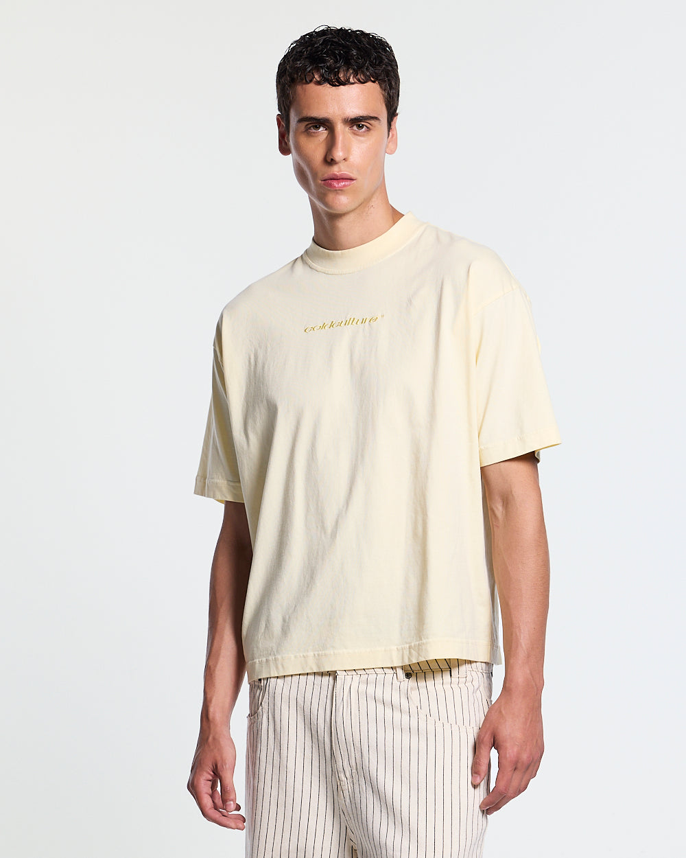 DISTRESS CURVED TEE YELLOW - pale yellow distressed tee, front view on male model - Cold Culture #man