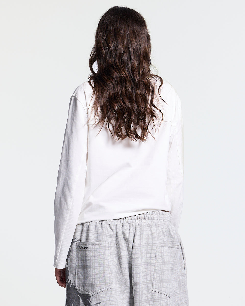 IDENTITY LONGSLEEVE WHITE - white embroidered longsleeve tee, back view on female model - Cold Culture #woman