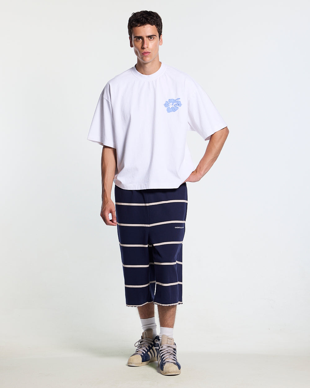 TROPICAL FEVER TEE WHITE - white hibiscus print tee, front view on male model - Cold Culture #man