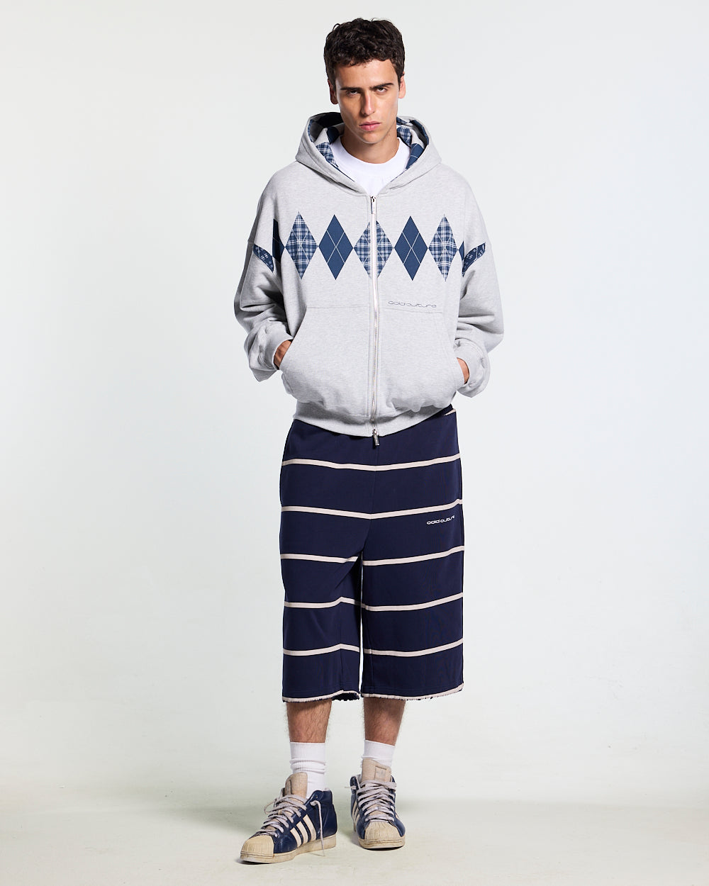 DECADE ZIP HOODIE HEATHER GREY - heather grey argyle zip hoodie, front view on male model - Cold Culture #man