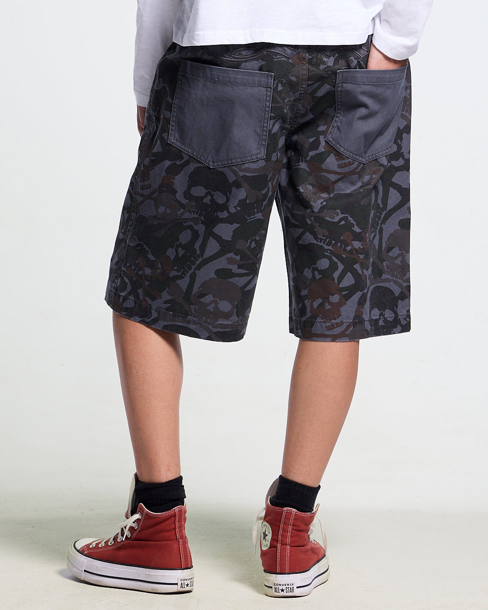 NIGHTSKULL SHORTS GREY - grey skull camo shorts, back view on female model - Cold Culture #woman