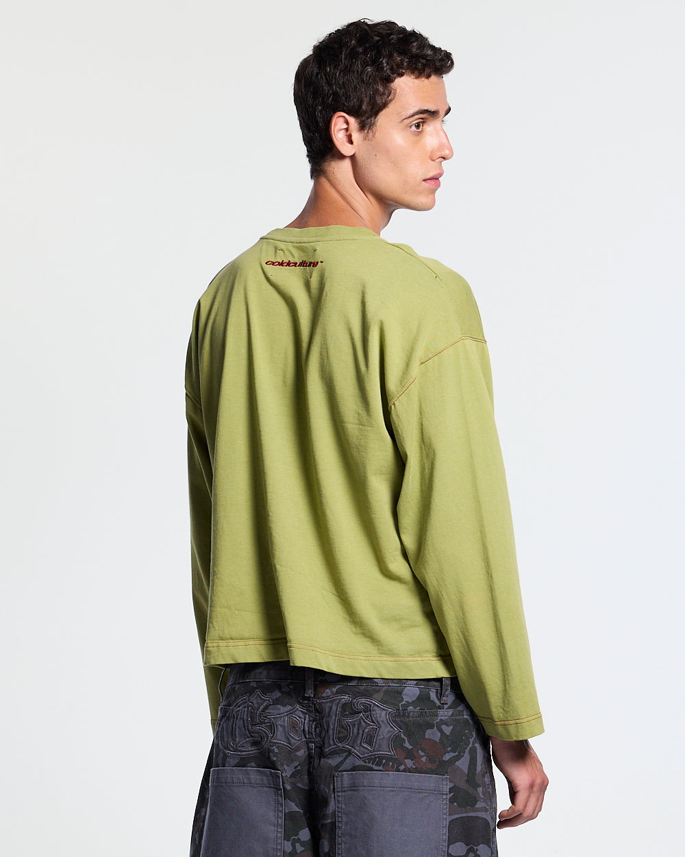FLYING FREE LONGSLEEVE GREEN - green graphic print longsleeve tee, side view on male model - Cold Culture #man