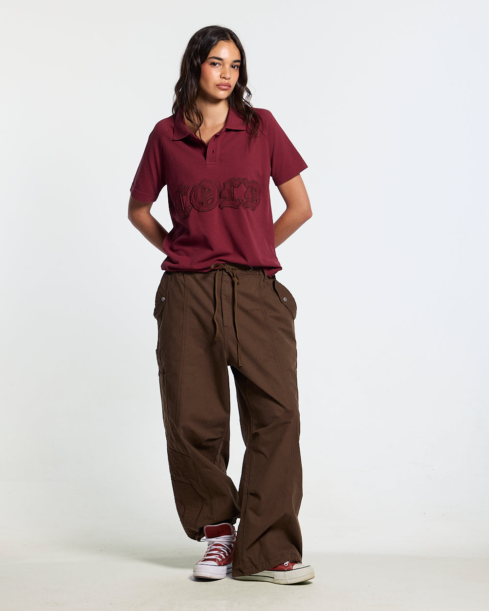 SOLID CARGO PANTS BROWN - brown cargo pants, front view on female model - Cold Culture #woman