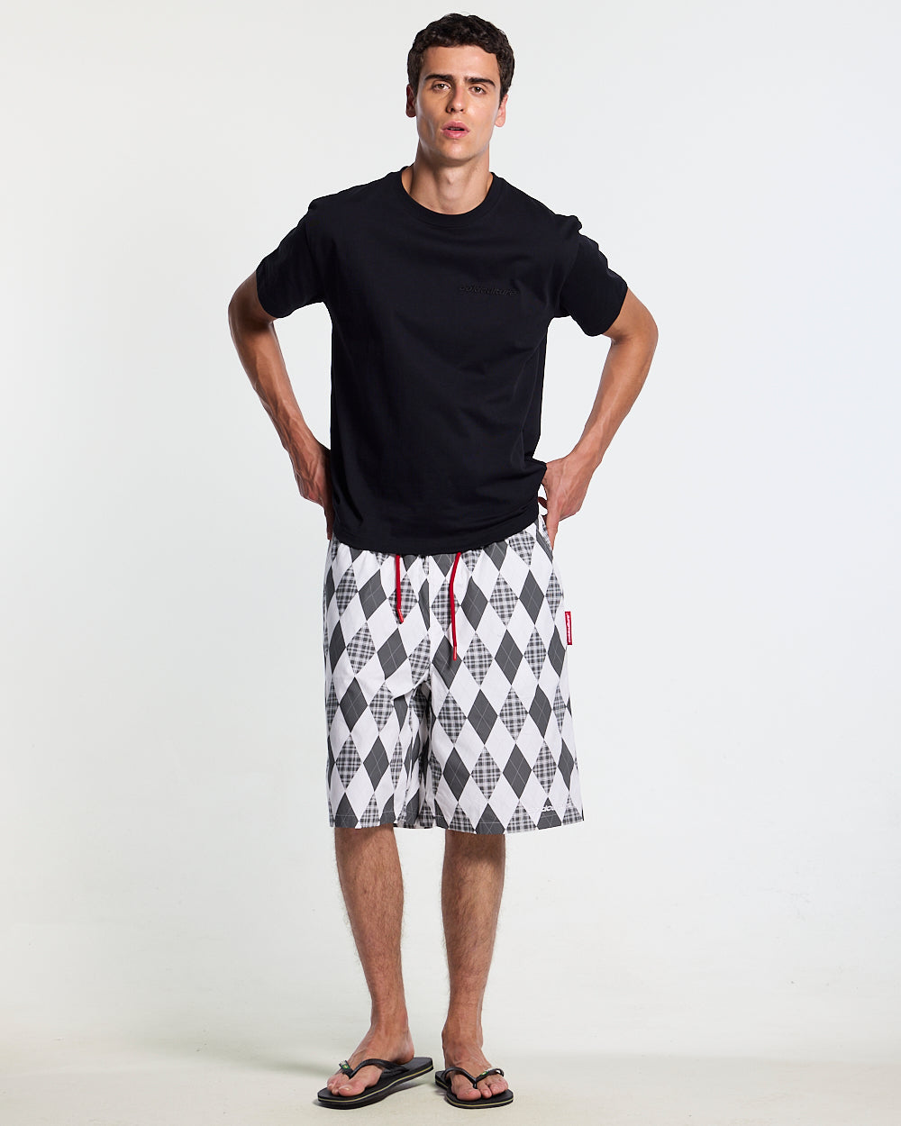 PREPPY SWIMSHORTS WHITE - white argyle swim shorts, front view on male model - Cold Culture #man