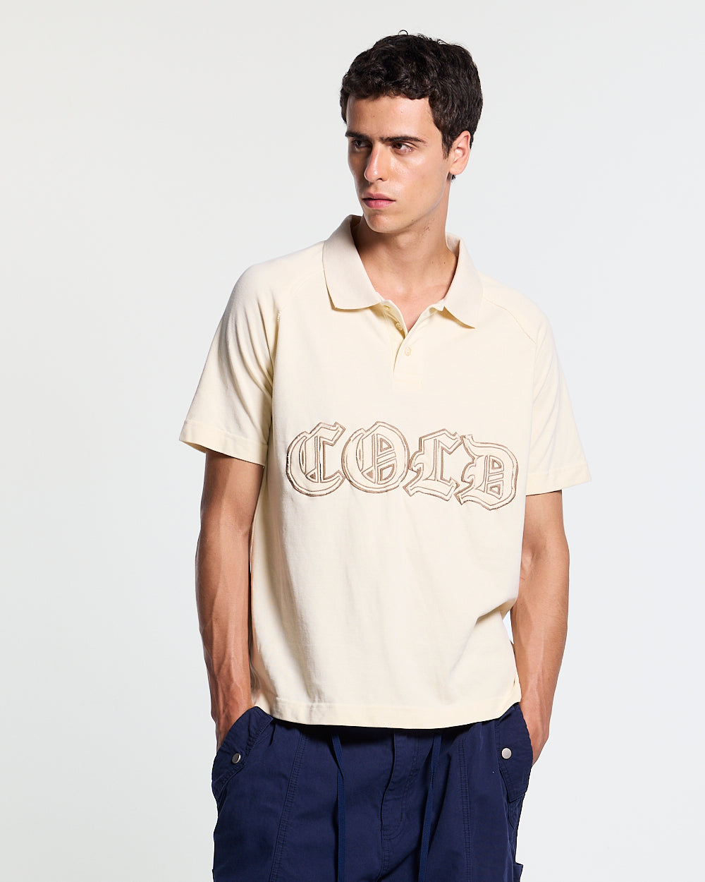 GOTHIC DISTRESSED POLO BEIGE - beige gothic print polo shirt, front view on male model - Cold Culture #man