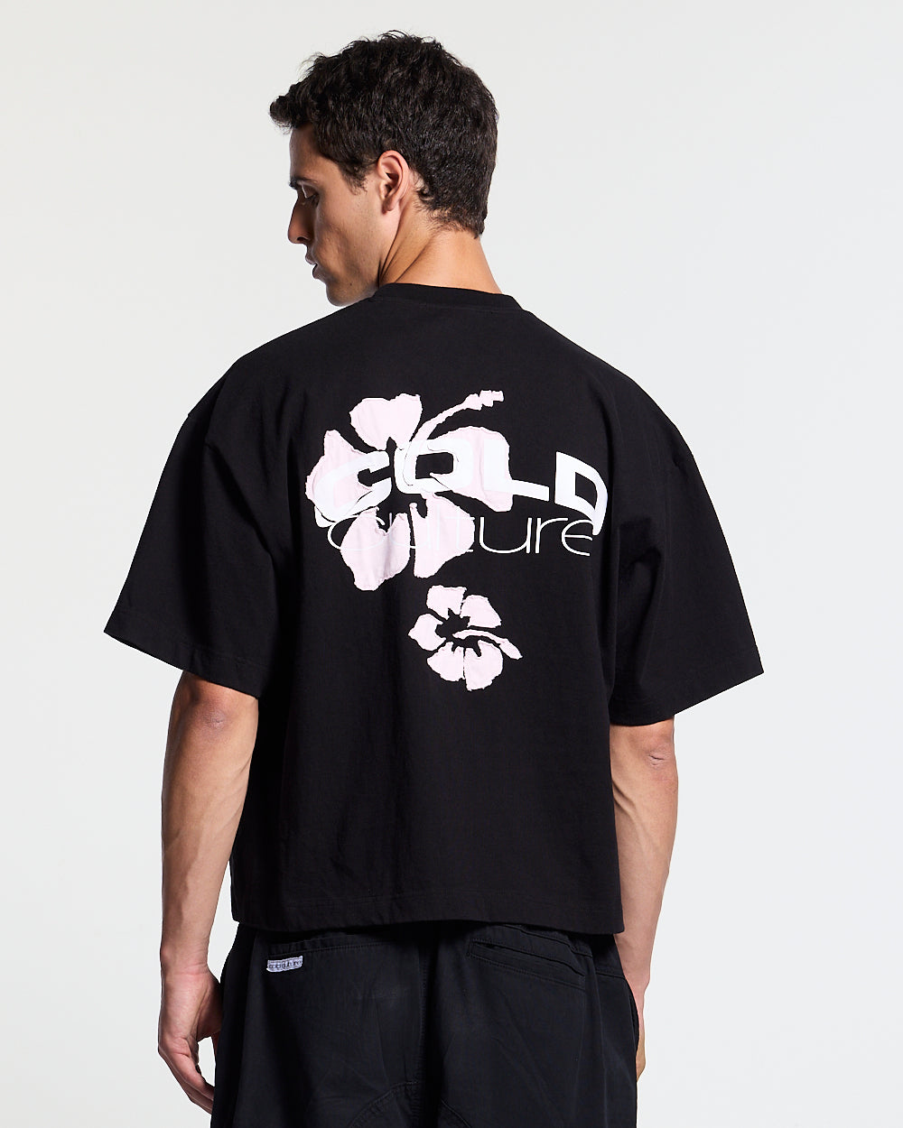 TROPICAL FEVER TEE BLACK - black hibiscus print tee, back view on male model - Cold Culture #man