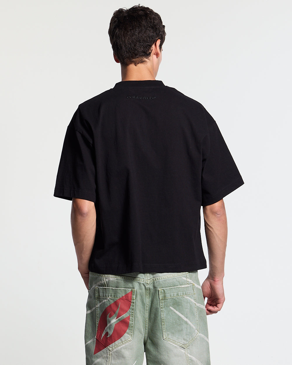 HUNTER TEE BLACK - black graphic print tee, back view on male model - Cold Culture #man