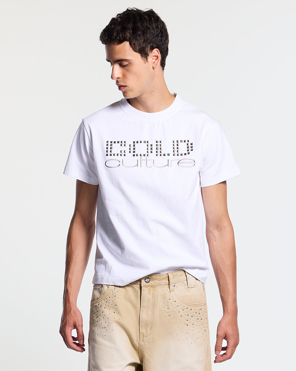 STARSTRUCK TEE WHITE - white studded logo tee, front view on male model - Cold Culture #man