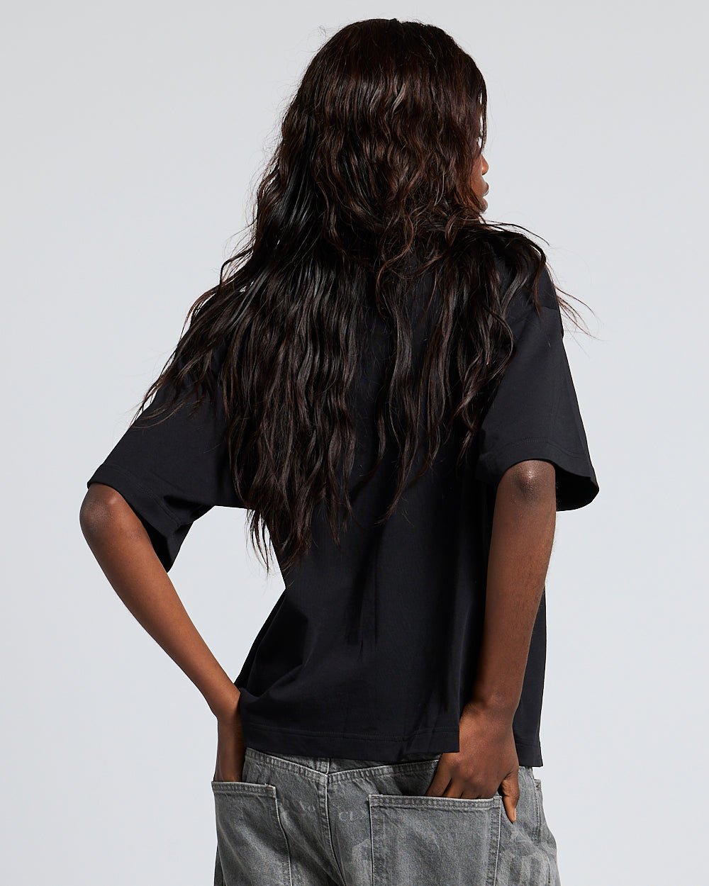 ADVENTURES TEE BLACK & WHITE - black graphic print tee, back view on female model - Cold Culture #woman