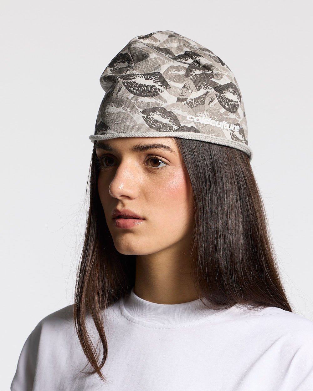 ARMOUR BEANIE LIGHT GREY - light grey graphic print beanie, on model close-up - Cold Culture #woman