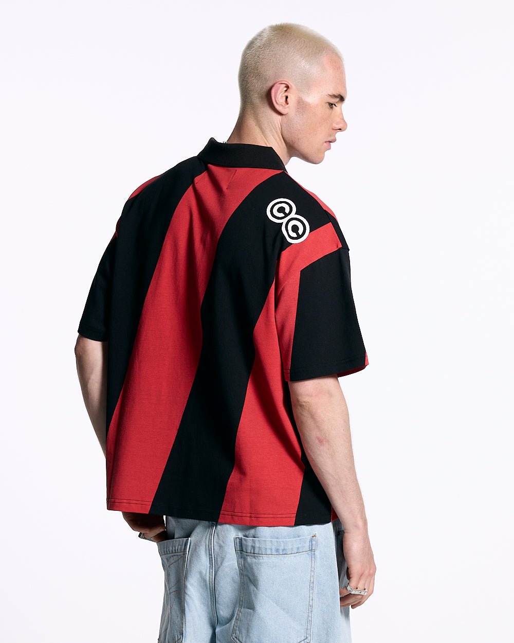 ASLANT STRIPES POLO TEE BLACK AND RED - red and black striped polo shirt, back view on male model - Cold Culture #man