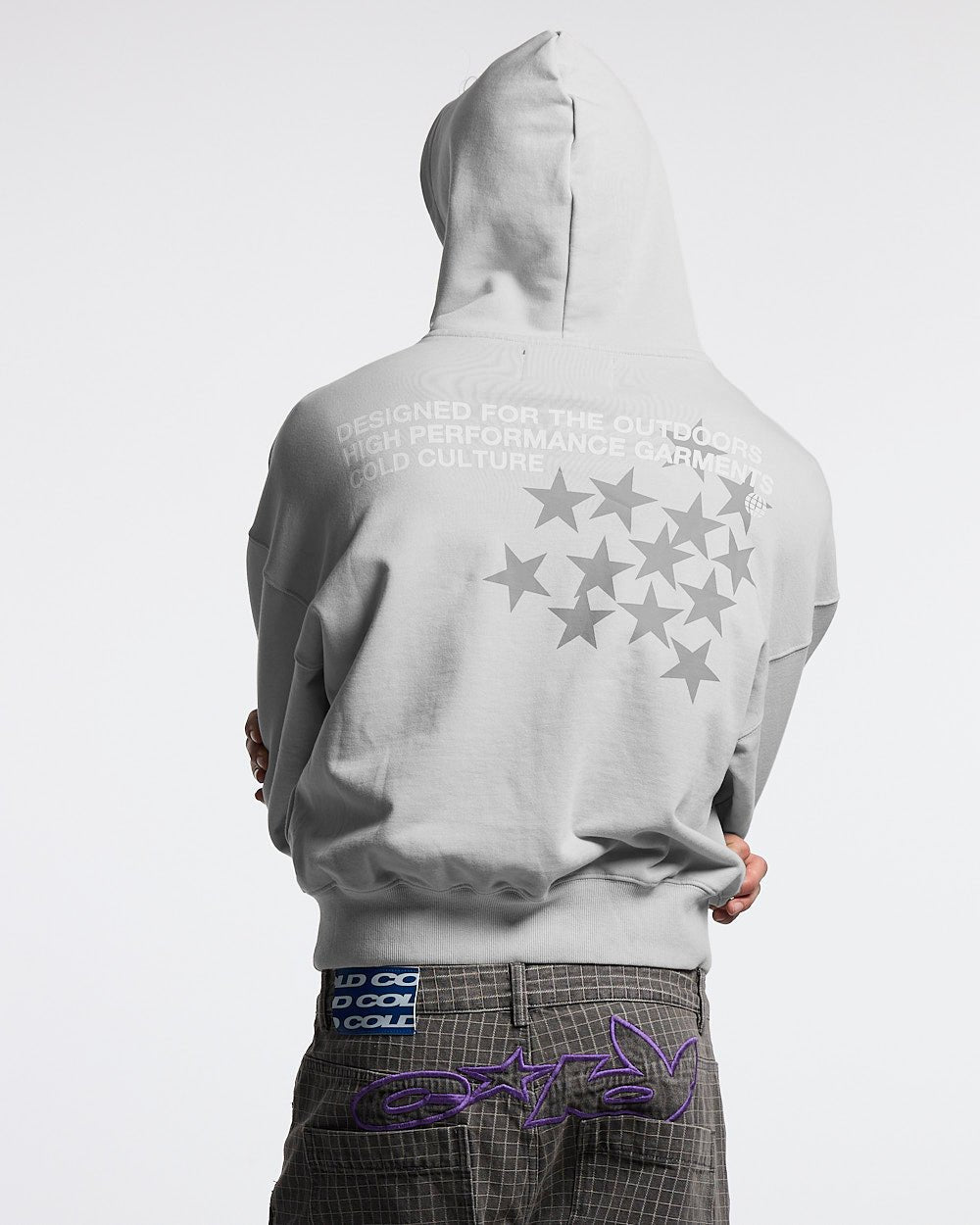 ASTRO HOODIE - light grey star print hoodie, back view on male model - Cold Culture