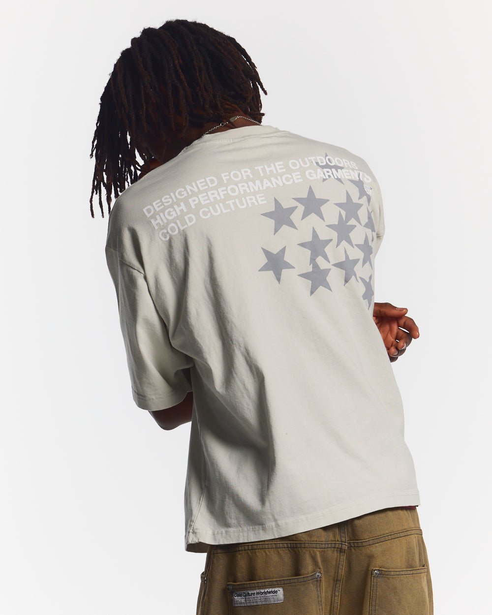 ASTRO TEE LIGHT GREY - light grey star print tee, back view on male model - Cold Culture #man