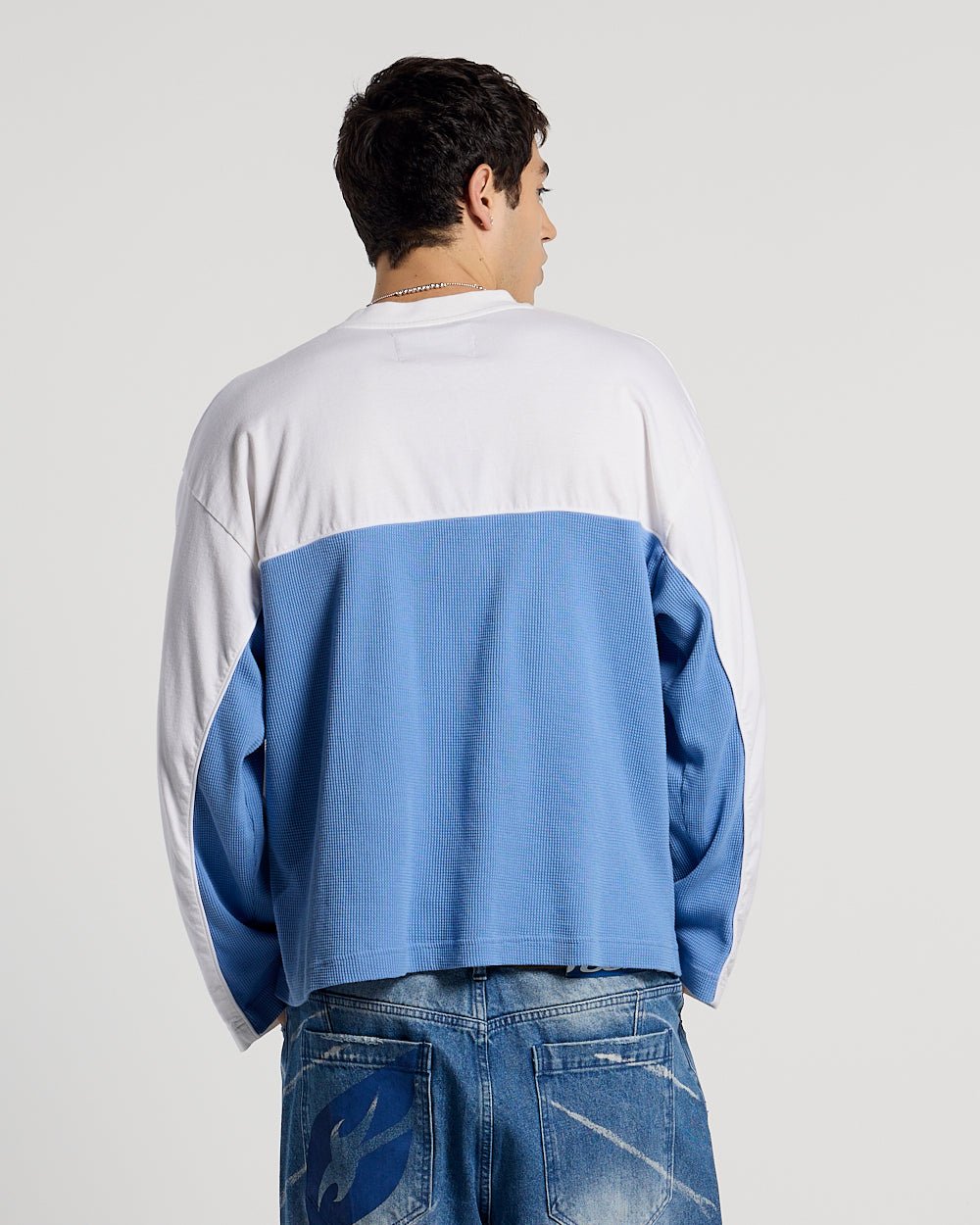 BICOLOR WAFFLE LONGSLEEVE BLUE & WHITE - blue and white colorblock longsleeve tee, back view on male model - Cold Culture #man