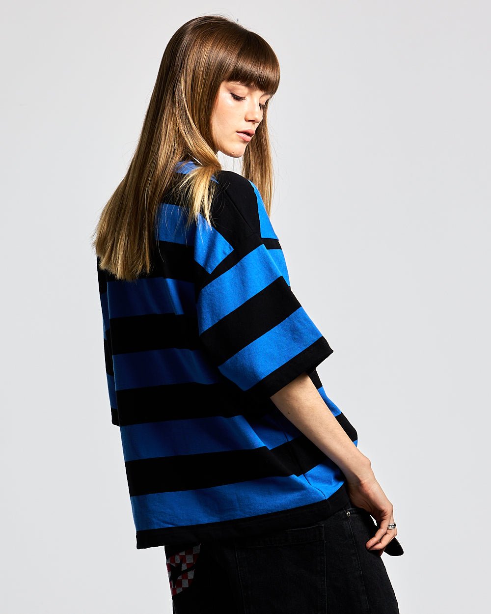 BIG STRIPES POLO T-SHIRT JASPER BLUE - blue and black striped polo shirt, back view on female model - Cold Culture #woman
