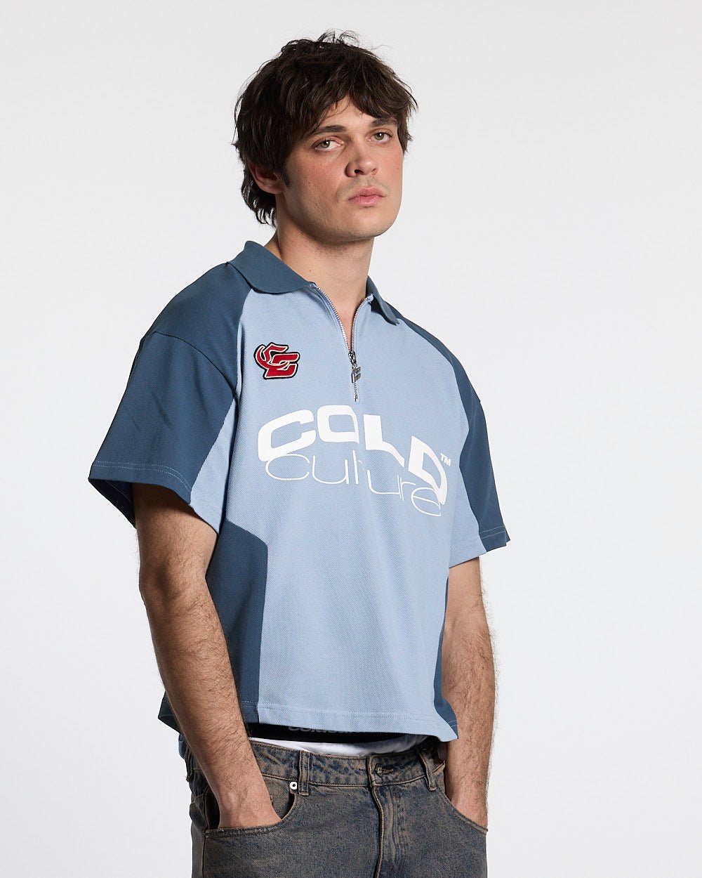 BIKER POLO LIGHT BLUE - light blue half-zip polo, front view on male model - Cold Culture #man