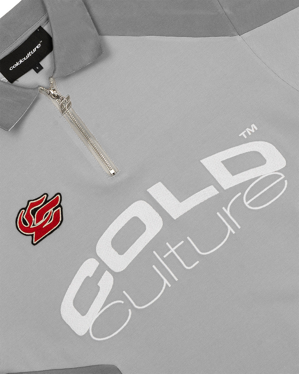 BIKER POLO LIGHT GREY - light grey half-zip polo, detail close-up - Cold Culture