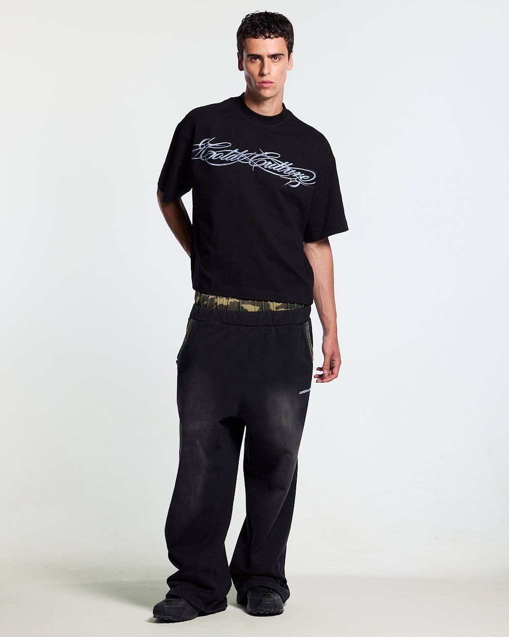 BLACK OPS SWEATPANTS BLACK - washed black sweatpants, front view on male model - Cold Culture #man
