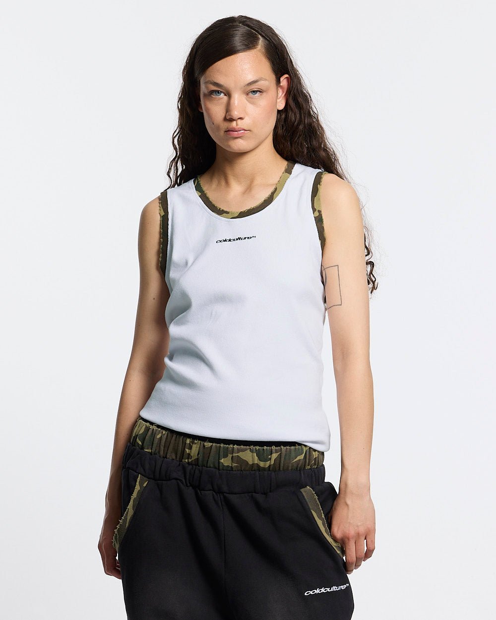 BLACK OPS TANK TOP WHITE - white tank top with camo trim, front view on female model - Cold Culture #woman