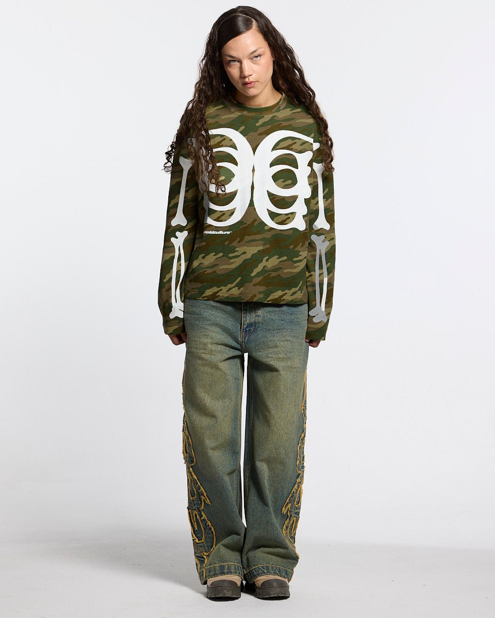BONEY LONGSLEEVE CAMO - camo skeleton print longsleeve tee, front view on female model - Cold Culture #woman
