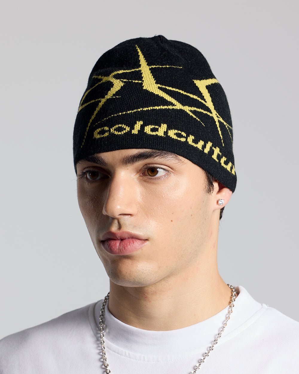 BRAMBLES BEANIE BLACK - black knit beanie, on model close-up - Cold Culture #man