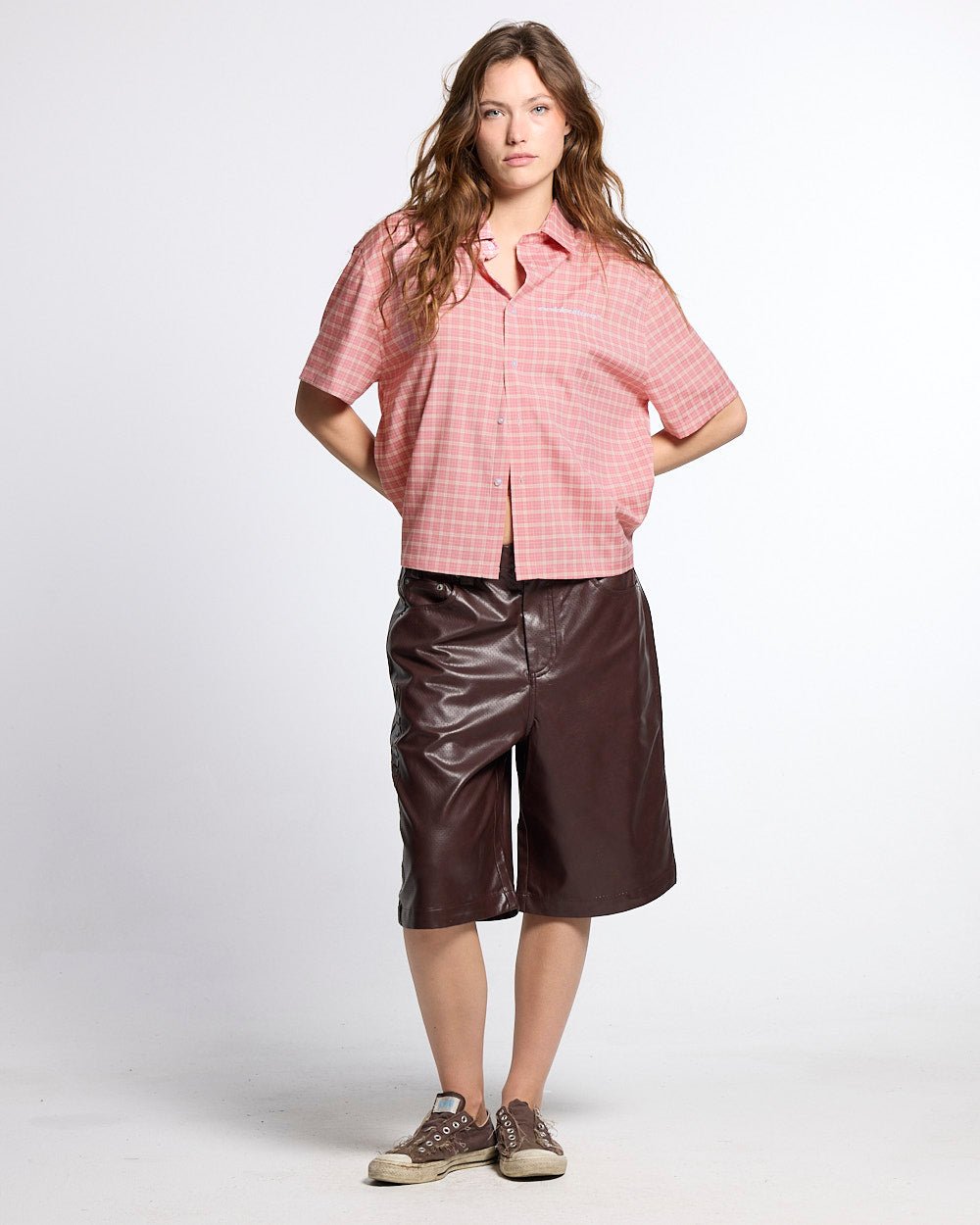BRAVE SHORTS BROWN - brown faux leather shorts, front view on female model - Cold Culture #woman