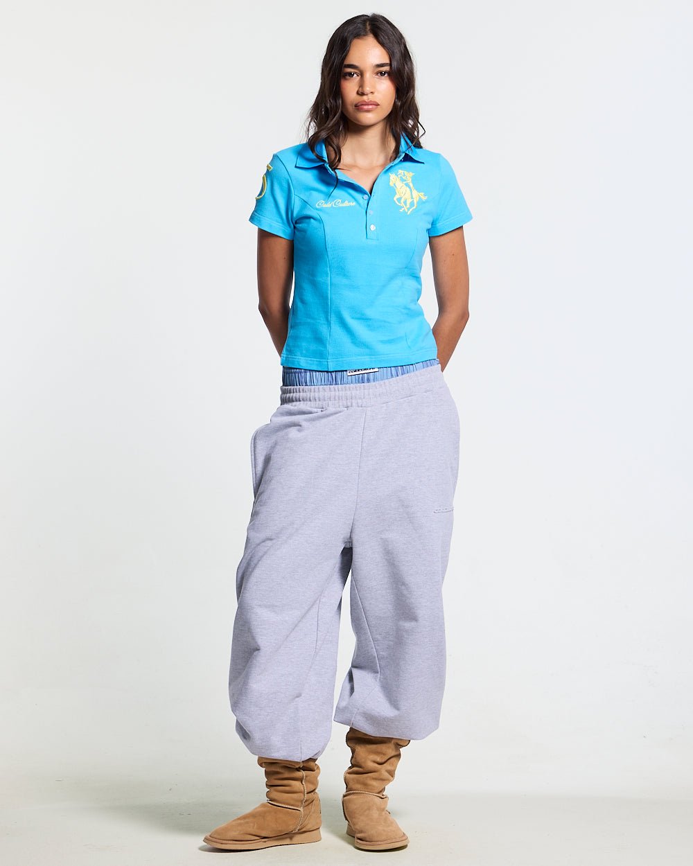 BRIDLE POLO BLUE - blue embroidered polo shirt, front view on female model - Cold Culture #woman