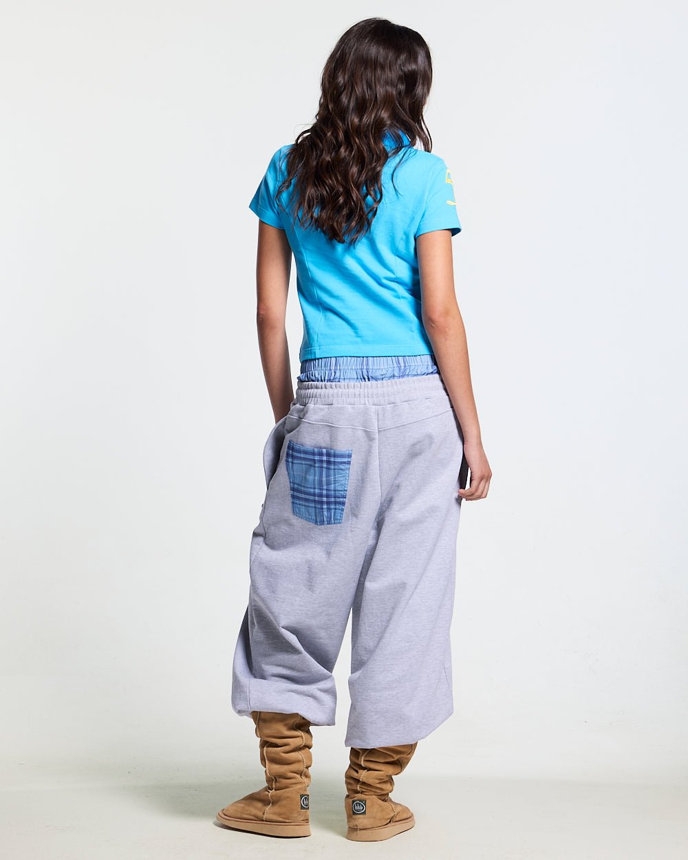 BRIDLE POLO BLUE - blue embroidered polo shirt, back view on female model - Cold Culture #woman