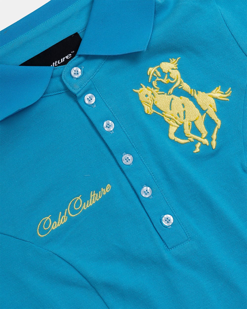 BRIDLE POLO BLUE - blue embroidered polo shirt, detail close-up - Cold Culture