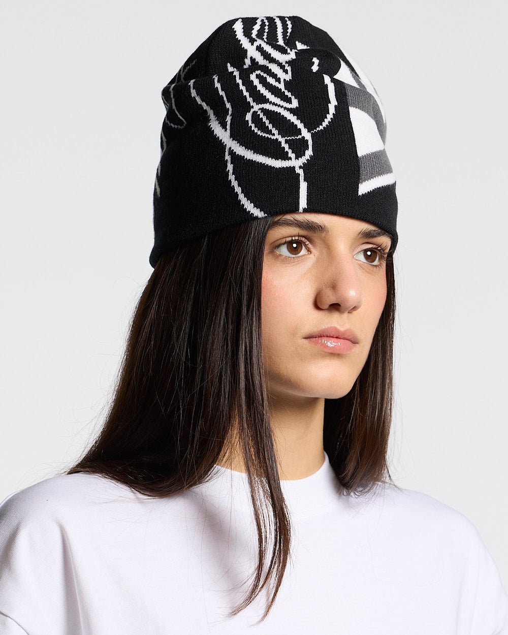 BRIGHTON BEANIE BLACK & GREY - black and grey knit beanie, on model close-up - Cold Culture #woman