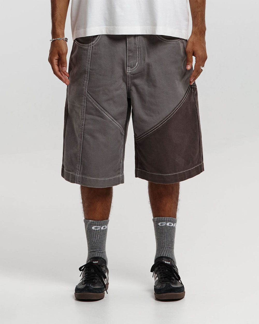 BUTTERFLY V2 SHORTS GREY/BLACK DENIM - grey black patchwork denim shorts, front view on male model - Cold Culture