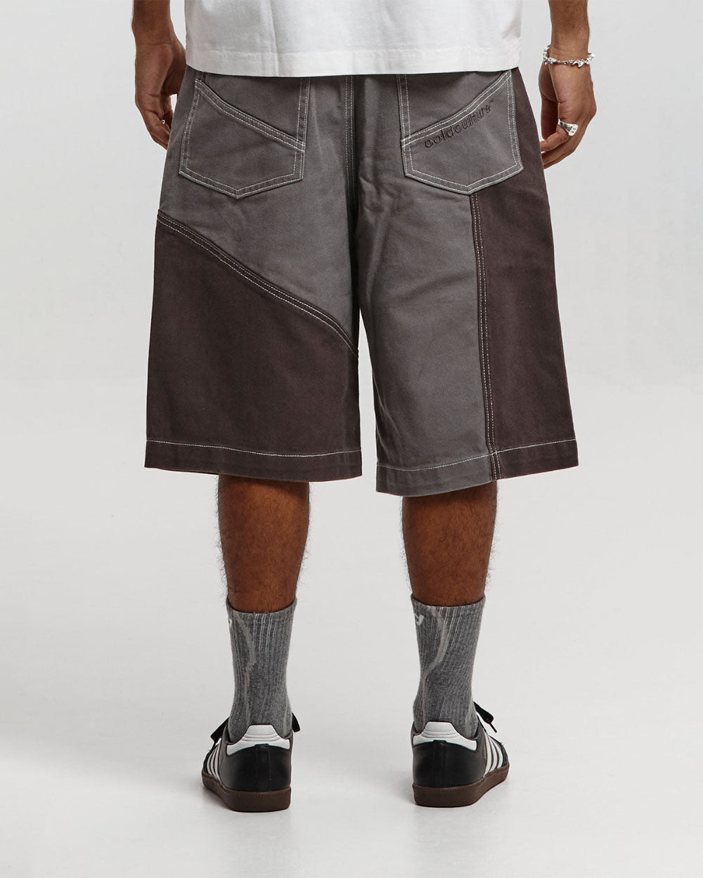 BUTTERFLY V2 SHORTS GREY/BLACK DENIM - grey black patchwork denim shorts, back view on male model - Cold Culture