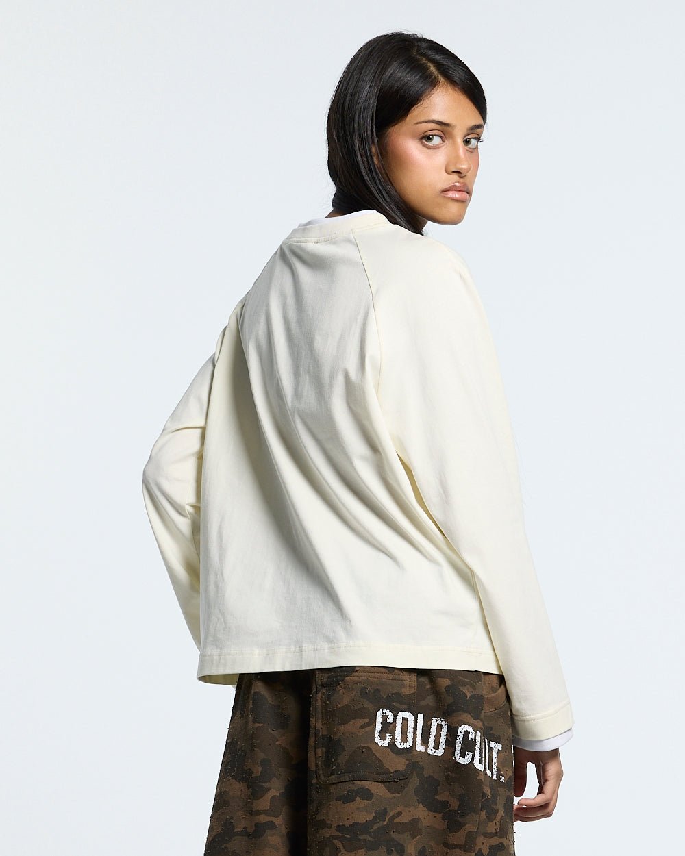 CAPUCCINO LONGSLEEVE CREAM - cream longsleeve tee, back view on female model - Cold Culture #woman