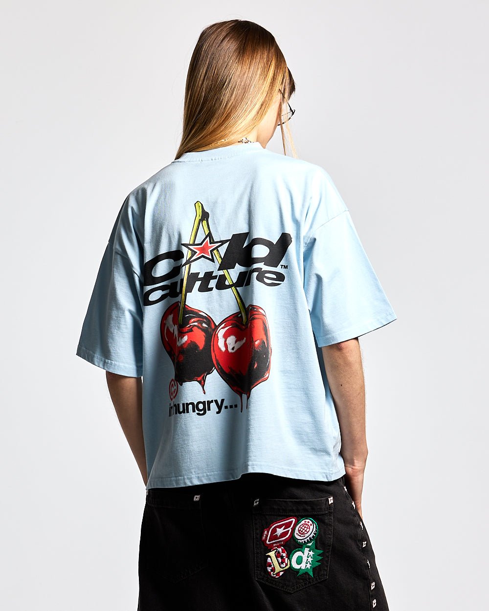 CHERRY TEE DREAM BLUE - light blue graphic print tee, back view on female model - Cold Culture #woman