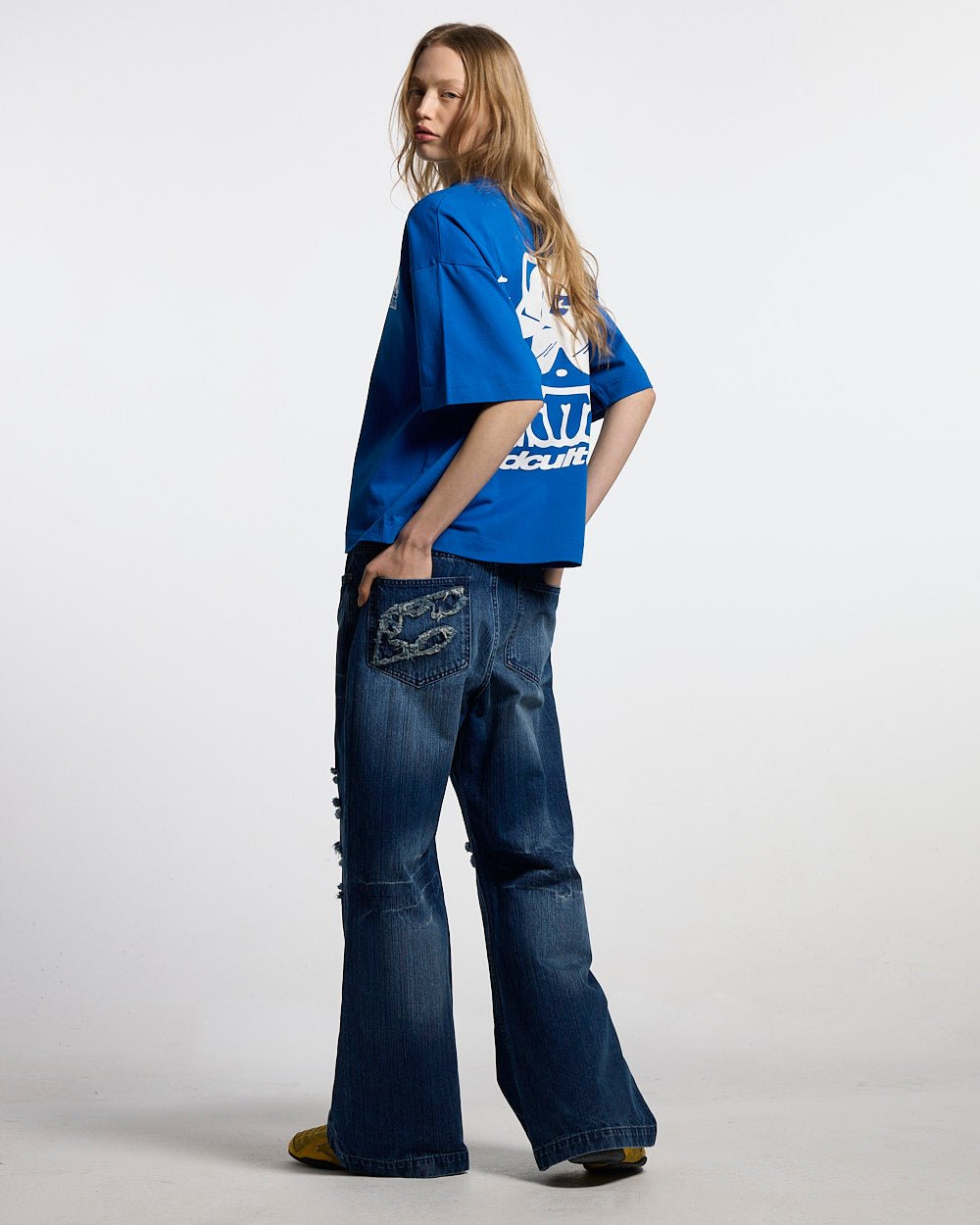 CIBERCAT TEE BLUE - blue graphic print tee, back view on female model - Cold Culture #woman