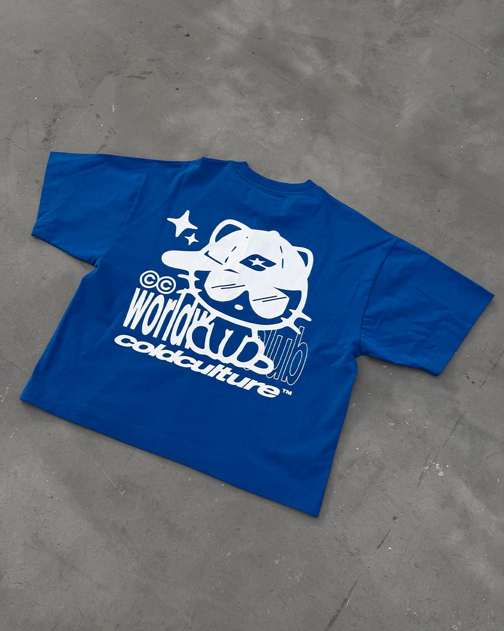CIBERCAT TEE BLUE - blue graphic print tee, flat lay - Cold Culture