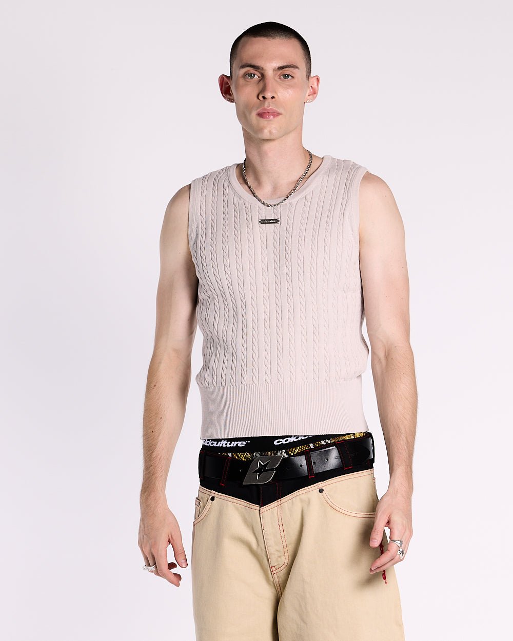 CLASSY KNIT TANK TOP - beige cable knit tank top, front view on male model - Cold Culture #man