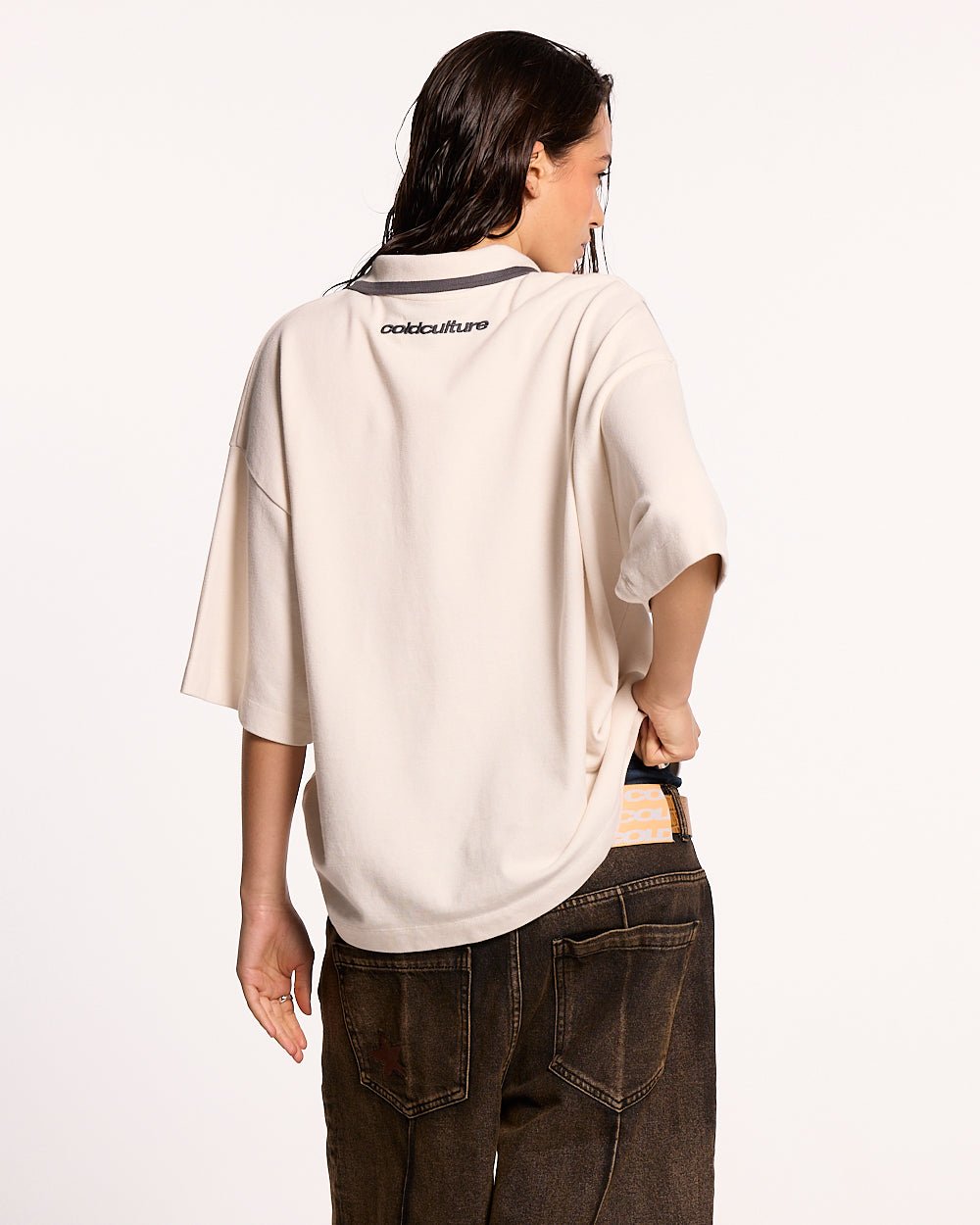 COCKY POLO GREY - grey graphic print polo shirt, back view on female model - Cold Culture #woman