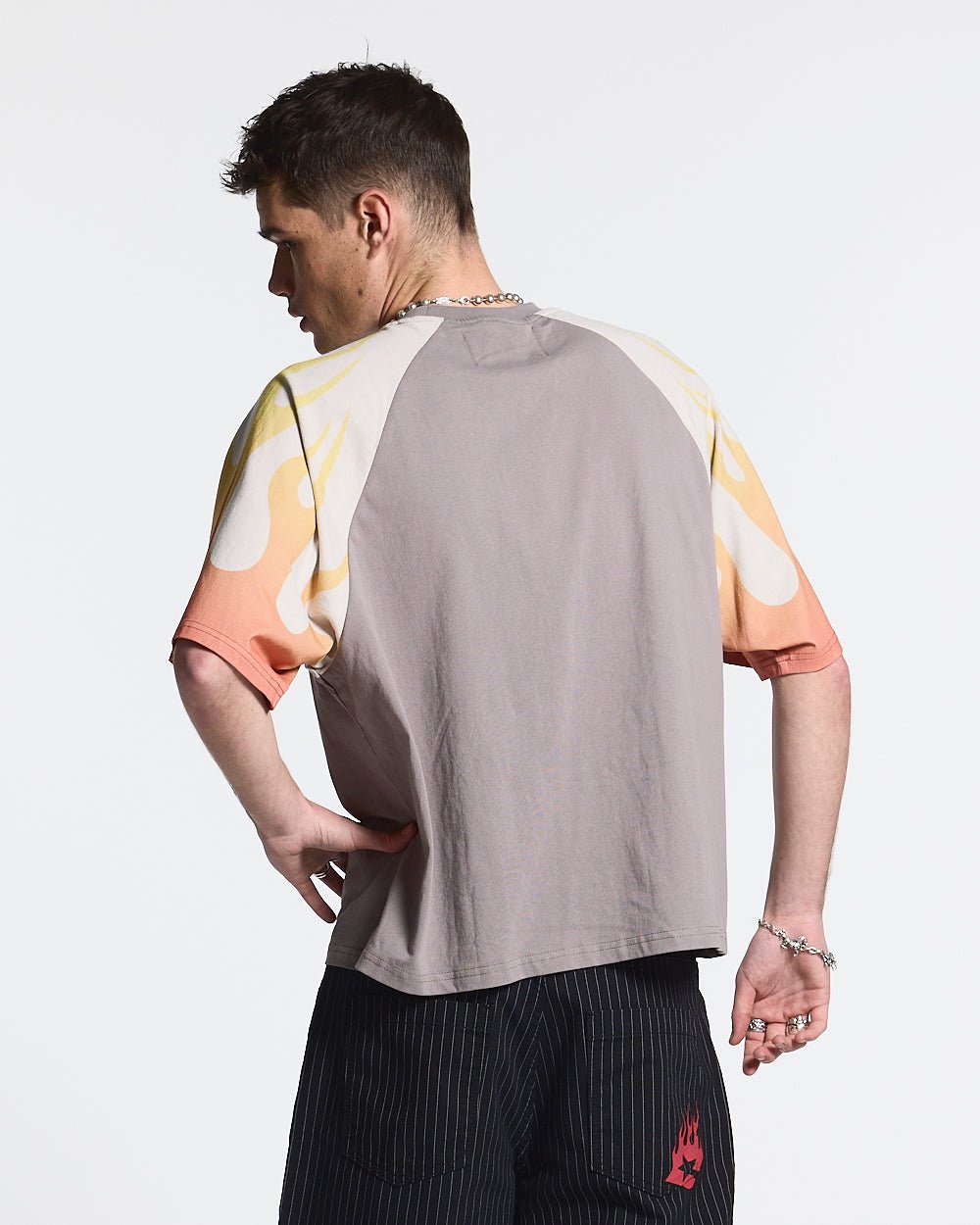 COLD FLAMES TEE ORANGE - grey and orange flame print tee, back view on male model - Cold Culture #man