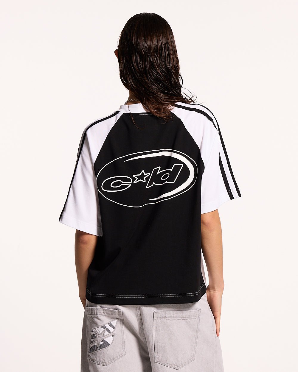 COMBO TEE BLACK - black and white raglan tee, back view on female model - Cold Culture #woman