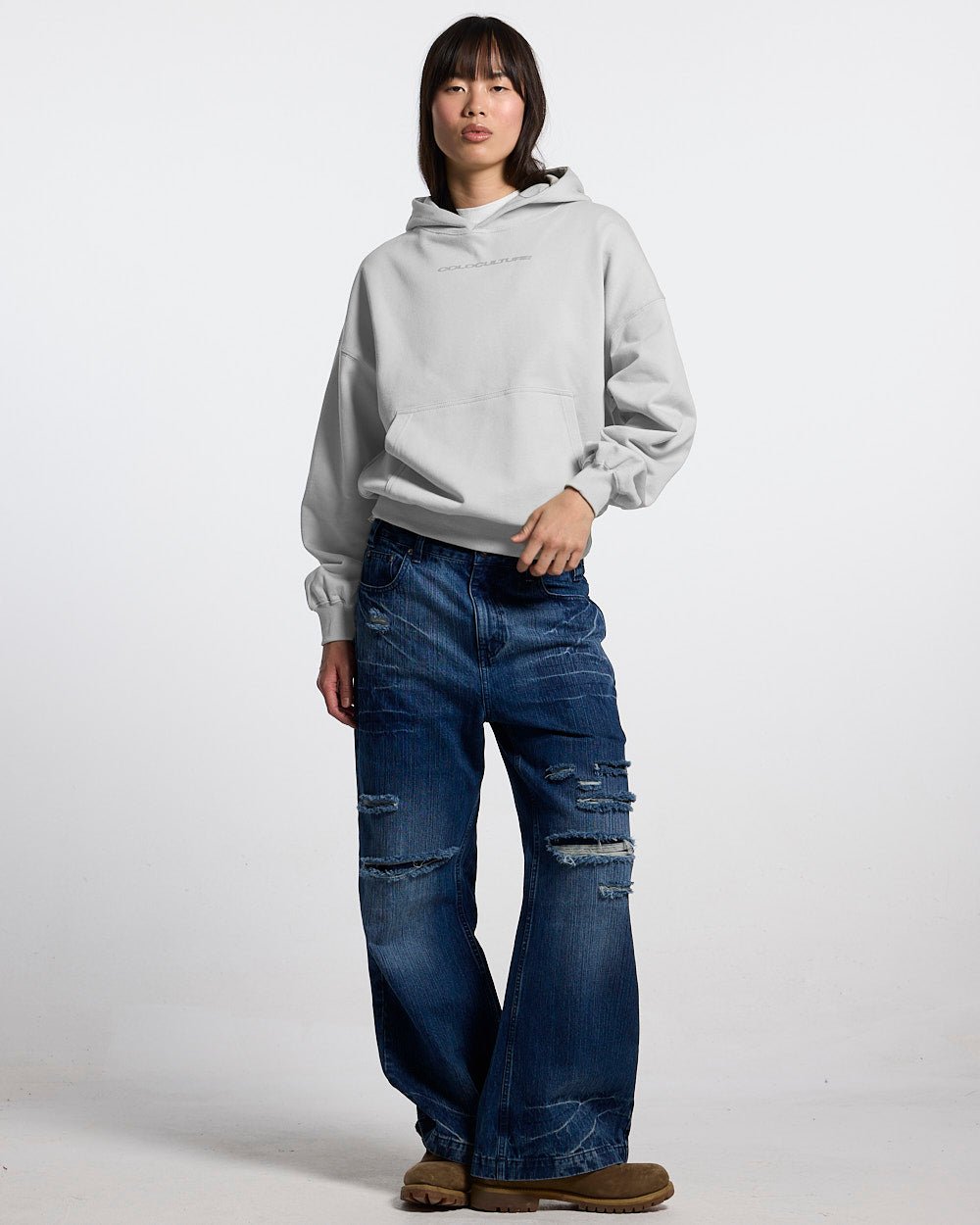 COSMOS ARC HOODIE LIGHT GREY - light grey oversized hoodie, front view on female model - Cold Culture #woman