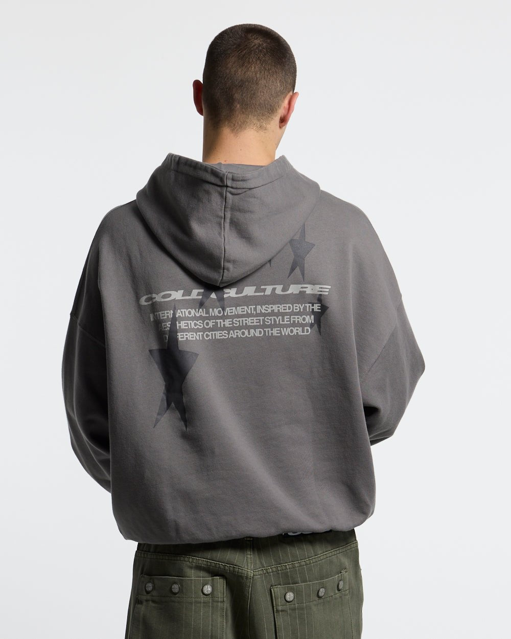 COSMOS ARC HOODIE SMOKEY GREY - grey star print hoodie, back view on male model - Cold Culture
