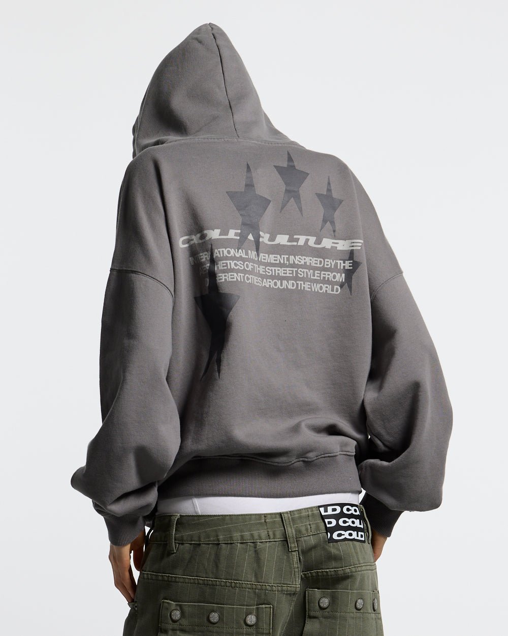COSMOS ARC HOODIE SMOKEY GREY - grey star print hoodie, back view on female model - Cold Culture #woman