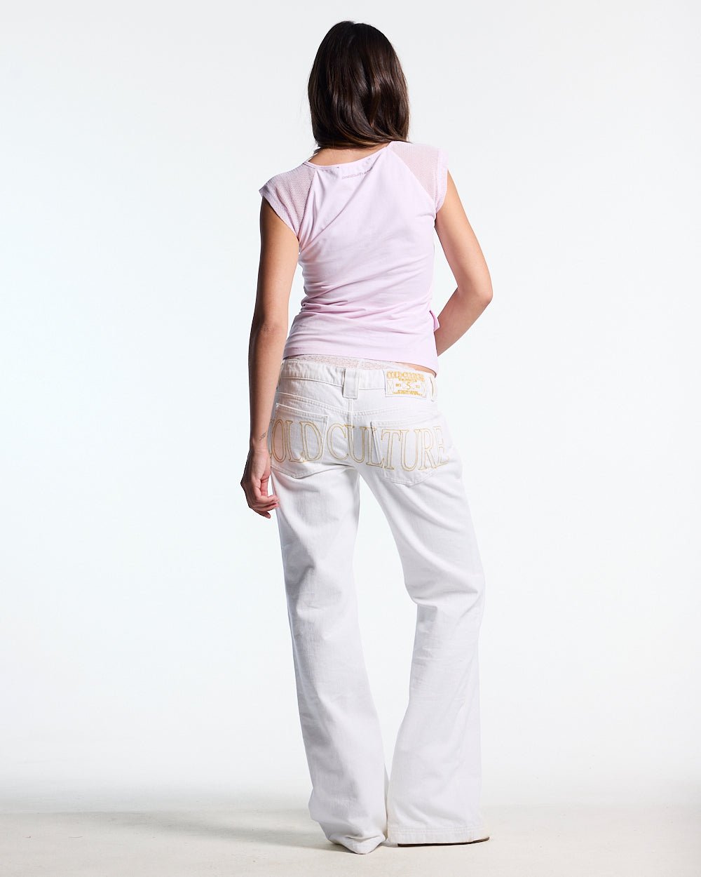 COUTURE BABY TEE PINK - pink graphic print baby tee, back view on female model - Cold Culture #woman