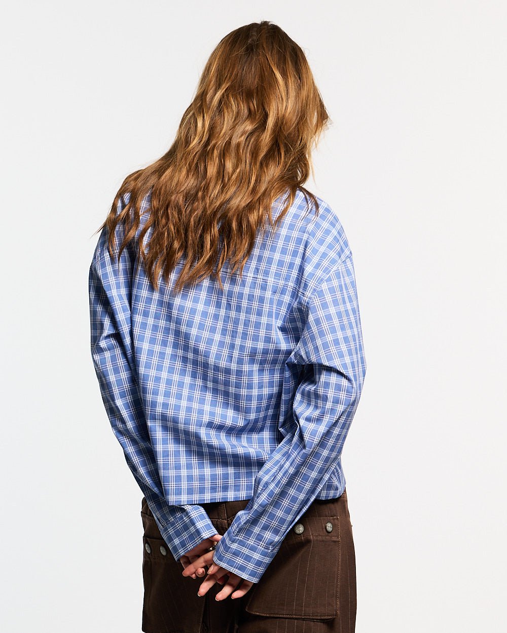 CROSS SHIRT BLUE - blue plaid long sleeve shirt, back view on female model - Cold Culture #woman