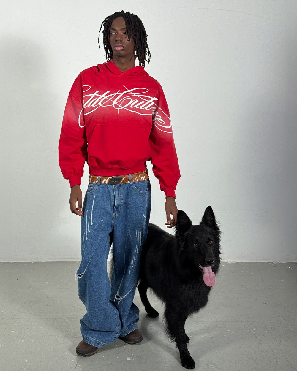 CROSSED SCRIPT HOODIE RED - red script print hoodie, street style shot - Cold Culture